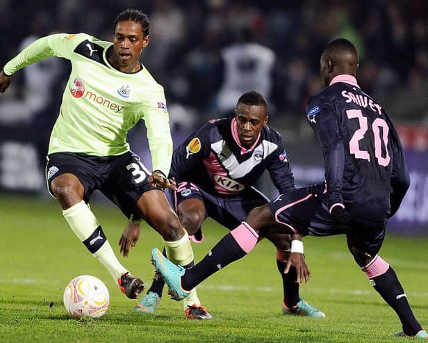 Newcastle's forward Nile Ranger (L) vies for the ball with Bordeaux's midfielder Henri Saivet (R) during the UEFA Europa League match between FC Girondins de Bordeaux and Newcastle United FC at the Chaban Delmas Stadium in Bordeaux on December 6, 2012. AFP PHOTO/ NICOLAS TUCAT        (Photo credit should read NICOLAS TUCAT/AFP via Getty Images)