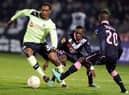 Newcastle's forward Nile Ranger (L) vies for the ball with Bordeaux's midfielder Henri Saivet (R) during the UEFA Europa League match between FC Girondins de Bordeaux and Newcastle United FC at the Chaban Delmas Stadium in Bordeaux on December 6, 2012. AFP PHOTO/ NICOLAS TUCAT        (Photo credit should read NICOLAS TUCAT/AFP via Getty Images)