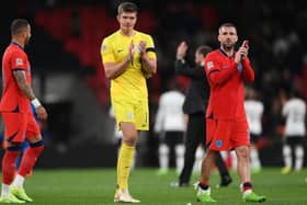 Nick Pope and Luke Shaw of England applaud the fans following the UEFA Nations League League A Group 3 match between England and Germany at Wembley Stadium on September 26, 2022 in London, England. (Photo by Shaun Botterill/Getty Images)