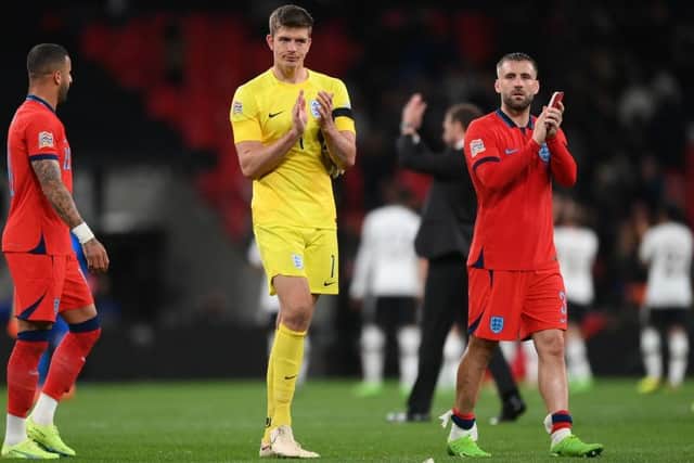 Nick Pope and Luke Shaw of England applaud the fans following the UEFA Nations League League A Group 3 match between England and Germany at Wembley Stadium on September 26, 2022 in London, England. (Photo by Shaun Botterill/Getty Images)