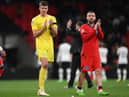 Nick Pope and Luke Shaw of England applaud the fans following the UEFA Nations League League A Group 3 match between England and Germany at Wembley Stadium on September 26, 2022 in London, England. (Photo by Shaun Botterill/Getty Images)
