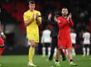 Nick Pope and Luke Shaw of England applaud the fans following the UEFA Nations League League A Group 3 match between England and Germany at Wembley Stadium on September 26, 2022 in London, England. (Photo by Shaun Botterill/Getty Images)
