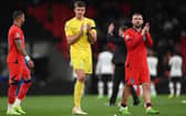 Nick Pope and Luke Shaw of England applaud the fans following the UEFA Nations League League A Group 3 match between England and Germany at Wembley Stadium on September 26, 2022 in London, England. (Photo by Shaun Botterill/Getty Images)