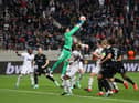 Newcastle United-linked Altay Bayindir of Fenerbahce paying against Eintracht Frankfurt in the Champions League (Photo by Alex Grimm/Getty Images)