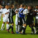 MARSEILLE, FRANCE - MAY 6:  Shay Given of Newcastle United tries to stop the melee as Marseille players argue with Lee Bowyer after his tackle during the UEFA Cup Semi-Final, Second Leg match between Olympique De Marseille and Newcastle United at the Stade Velodrome on May 6, 2004 in Marseille, France. (Photo by Christopher Lee/Getty Images)