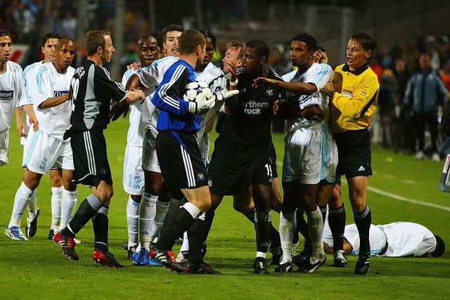 MARSEILLE, FRANCE - MAY 6:  Shay Given of Newcastle United tries to stop the melee as Marseille players argue with Lee Bowyer after his tackle during the UEFA Cup Semi-Final, Second Leg match between Olympique De Marseille and Newcastle United at the Stade Velodrome on May 6, 2004 in Marseille, France. (Photo by Christopher Lee/Getty Images)