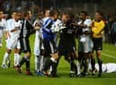 MARSEILLE, FRANCE - MAY 6:  Shay Given of Newcastle United tries to stop the melee as Marseille players argue with Lee Bowyer after his tackle during the UEFA Cup Semi-Final, Second Leg match between Olympique De Marseille and Newcastle United at the Stade Velodrome on May 6, 2004 in Marseille, France. (Photo by Christopher Lee/Getty Images)