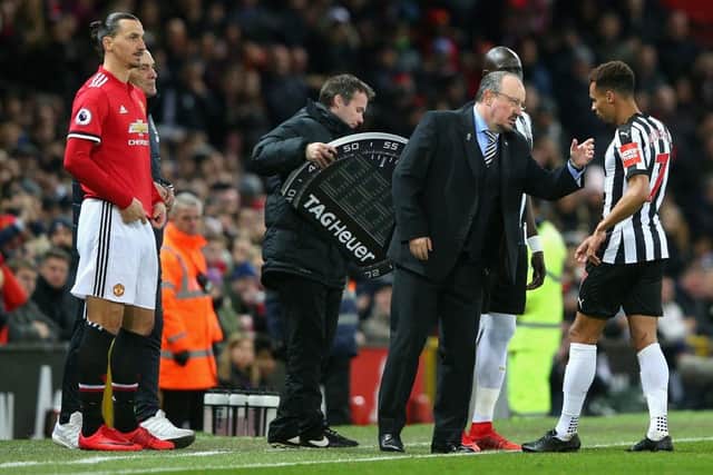 Then-Newcastle United manager Rafa Benitez gives instructions to Jacob Murphy at OId Trafford in November 2017.
