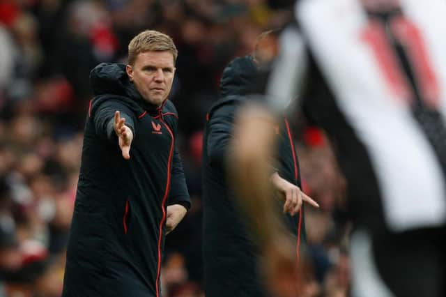 Eddie Howe gestures from the touchine.