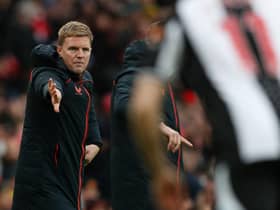 Eddie Howe gestures from the touchine.