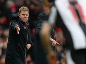 Eddie Howe gestures from the touchine.