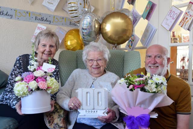 Mary Reeves celebrates her 100th birthday with family and her daughter Maureen White and son Steve Reeves.