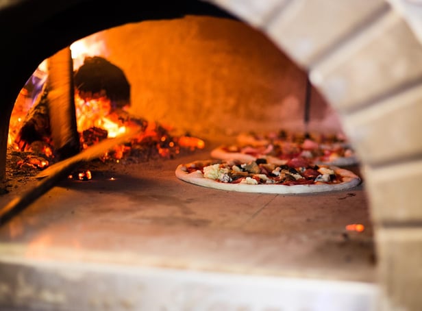 The pizzeria would have an authentic wood-fired oven