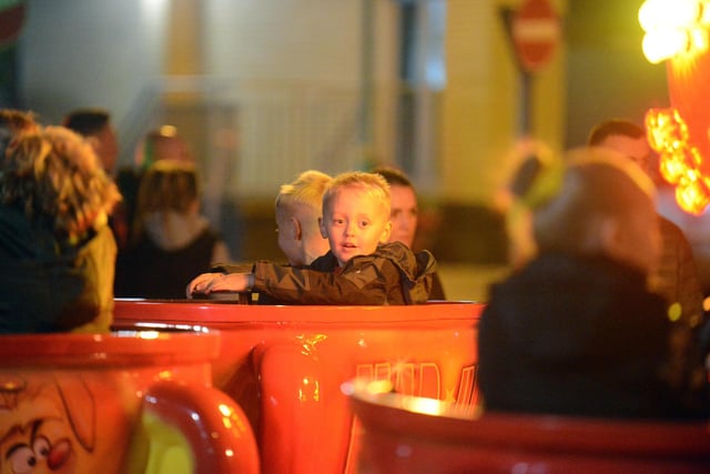 Fun on the teacup ride as the Christmas Festival gets underway.