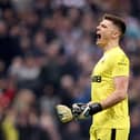 Nick Pope of Newcastle United celebrates after their side scored their first goal during the Premier League match between Newcastle United and Chelsea FC at St. James Park on November 12, 2022 in Newcastle upon Tyne, England. (Photo by George Wood/Getty Images)