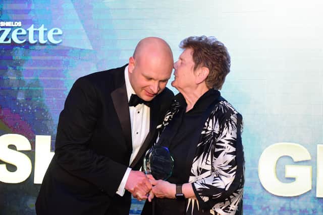 Editor of the Shields Gazette Ross Robertson presents the Lifetime Achievement Award to Sheila Graber.
