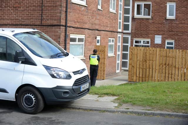 Police at the scene of a murder investigation in Victoria Road, South Shields.