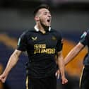 Dylan Stephenson (L)  celebrates with his teammate Cameron Ferguson of Newcastle United after scoring his team's first goal during the Papa John's EFL Trophy Group match between Mansfield  Town and Newcastle United U21 at  on November 09, 2021 in Mansfield, England. (Photo by Laurence Griffiths/Getty Images)