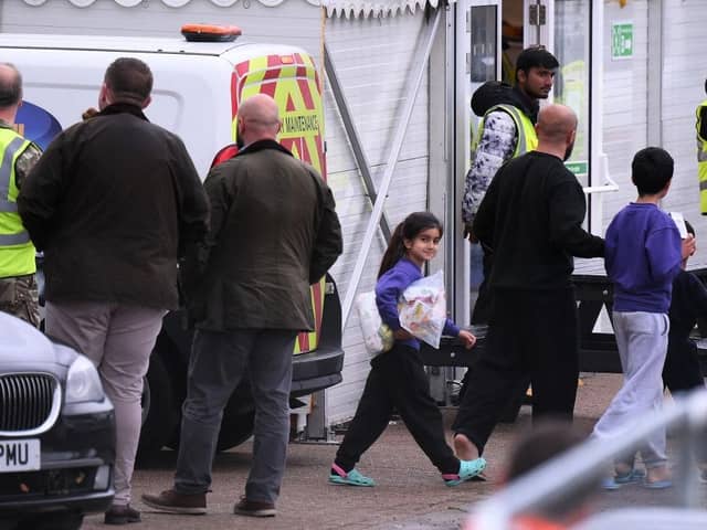 Detainees are seen inside the Manston holding centre for asylum seekers. Immigration minister Robert Jenrick this week vowed "more radical" policies to counter illegal migration.