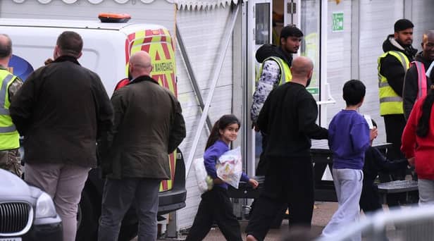 Detainees are seen inside the Manston holding centre for asylum seekers. Immigration minister Robert Jenrick this week vowed "more radical" policies to counter illegal migration.