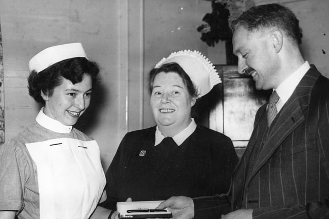 S Fraser, consultant obstetric surgeon at South Shields Maternity Hospital, presented the first prize for the highest marks gained during the year 1956 - 57 to pupil midwife June Cook. May 5 is the International Day of the Midwife.