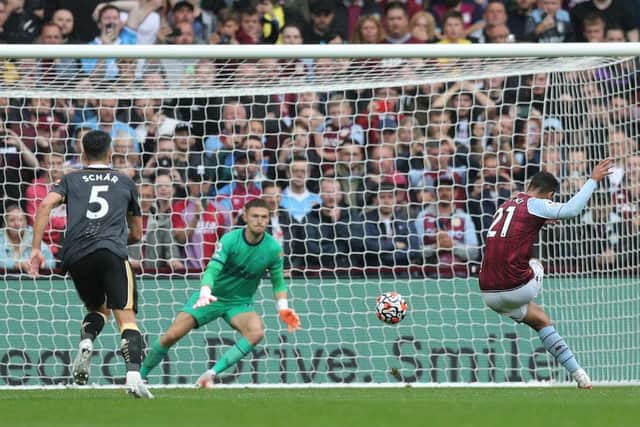 Anwar El Ghazi of Aston Villa scores their side's second goal from the penalty spot past Freddie Woodman of Newcastle United during the Premier League match between Aston Villa and Newcastle United at Villa Park on August 21, 2021 in Birmingham, England. (Photo by Alex Morton/Getty Images)