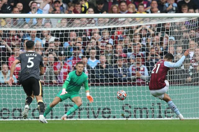 Anwar El Ghazi of Aston Villa scores their side's second goal from the penalty spot past Freddie Woodman of Newcastle United during the Premier League match between Aston Villa and Newcastle United at Villa Park on August 21, 2021 in Birmingham, England. (Photo by Alex Morton/Getty Images)