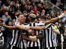 NEWCASTLE UPON TYNE, ENGLAND - FEBRUARY 04: Joelinton and Sven Botman of Newcastle United celebrate after Joe Willock (Hidden) scored a goal that was later disallowed during the Premier League match between Newcastle United and West Ham United at St. James Park on February 04, 2023 in Newcastle upon Tyne, England. (Photo by George Wood/Getty Images)