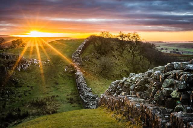 Hadrian's Wall looking west at sunset from Walltown Crags. ColobusYeti - stock.adobe.com