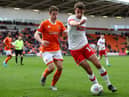 Dan Barlaser, right, playing for Rotherham United.