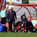 Lee Johnson watches on at the LNER Stadium as Sunderland fall to a 2-0 defeat