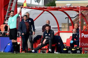 Lee Johnson watches on at the LNER Stadium as Sunderland fall to a 2-0 defeat