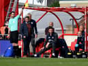 Lee Johnson watches on at the LNER Stadium as Sunderland fall to a 2-0 defeat
