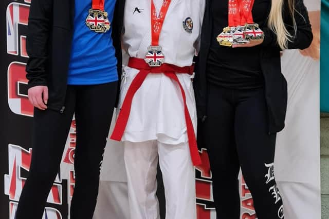 Katie Hunnam, Elle Smith and Eleisha Mitchinson with their medals.