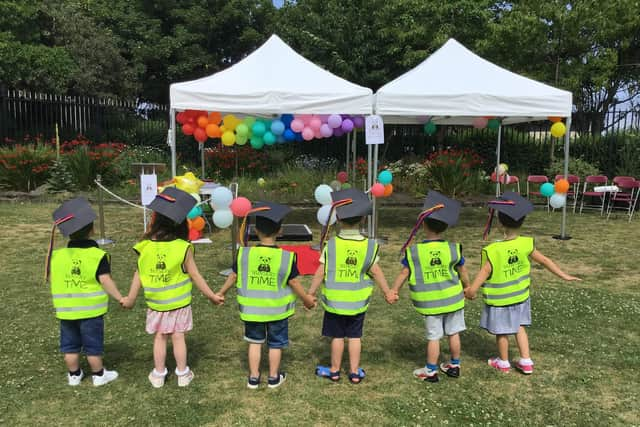 Nurserytime Kindergarten youngsters wore traditional caps during the graduation ceremony.