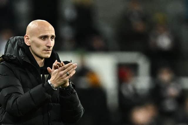 English midfielder Jonjo Shelvey applauds Newcastle United's fans as he prepares to leave the club for Nottingham Forest, during the English League Cup semi final football match between Newcastle United and Southampton at St James's Park stadium in Newcastle, on January 31, 2023. (Photo by PAUL ELLIS/AFP via Getty Images)