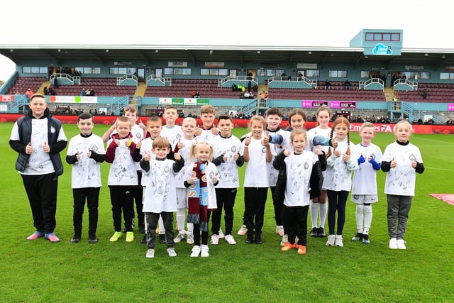 Football stars of the future on the pitch before the FA Cup match kick-off. Picture: Kev Wilson.