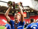 Lewis Cass of Hartlepool United celebrates with the trophy following the Vanarama National League Play-Off Final match between Hartlepool United and Torquay United at Ashton Gate on June 20, 2021 in Bristol, England. (Photo by Harry Trump/Getty Images)