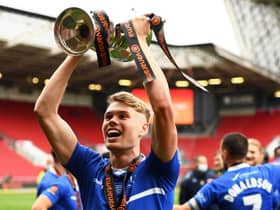 Lewis Cass of Hartlepool United celebrates with the trophy following the Vanarama National League Play-Off Final match between Hartlepool United and Torquay United at Ashton Gate on June 20, 2021 in Bristol, England. (Photo by Harry Trump/Getty Images)