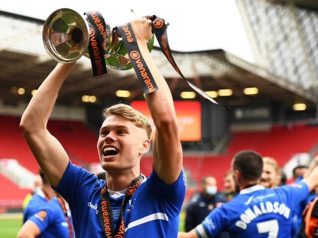 Lewis Cass of Hartlepool United celebrates with the trophy following the Vanarama National League Play-Off Final match between Hartlepool United and Torquay United at Ashton Gate on June 20, 2021 in Bristol, England. (Photo by Harry Trump/Getty Images)