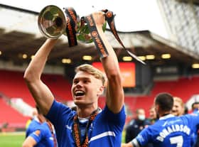 Lewis Cass of Hartlepool United celebrates with the trophy following the Vanarama National League Play-Off Final match between Hartlepool United and Torquay United at Ashton Gate on June 20, 2021 in Bristol, England. (Photo by Harry Trump/Getty Images)