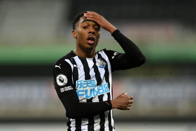 Joe Willock of Newcastle United cuts a dejected figure on the final whistle following the Premier League match between Newcastle United and Manchester City at St. James Park on May 14, 2021 in Newcastle upon Tyne, England.