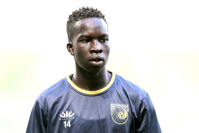 Garang Kuol of the Mariners warms up ahead of the round nine A-League Men's match between Melbourne City and Central Coast Mariners at AAMI Park, on December 27, 2022, in Melbourne, Australia. (Photo by Morgan Hancock/Getty Images)