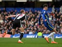 Kai Havertz gets ahead of Dan Burn to score for Chelsea.