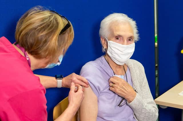 Joan Myers receives her Covid vaccine.