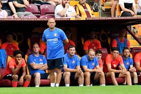 Alex Neil watches on at Valley Parade