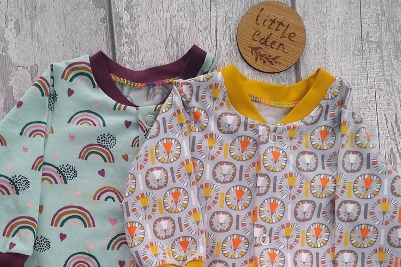 Littleedenclothes sells unique handmade clothes from premmie to toddler. These are baby rompers.