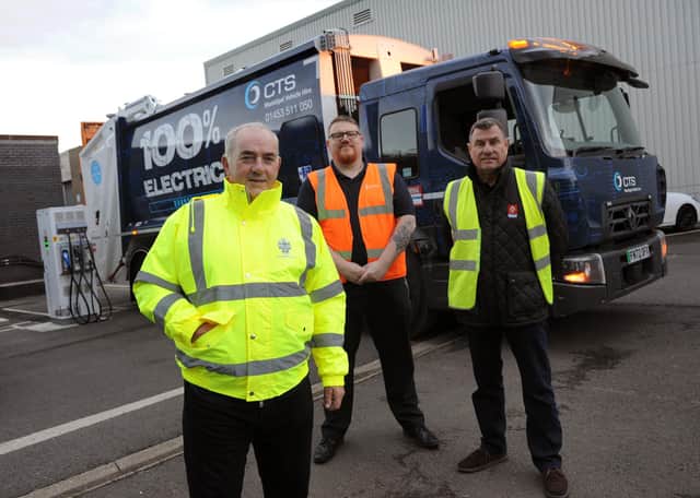 South Tyneside Council Cllr Ernest Gibson with an Electric Refuse Truck.