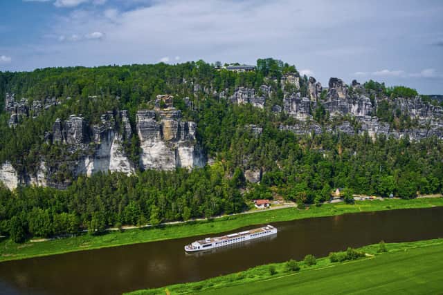 Sailing along the Elbe River in the Saxon Switzerland region of Germany. Image: White Rain Productions