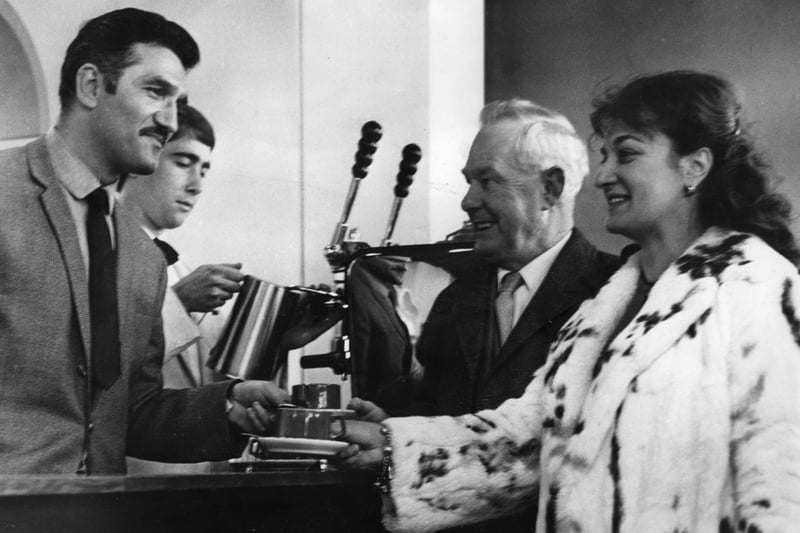 A November 1966 photo showing the new bar at Wouldhave House with Lennard May - South Shields entertainments official - and Mrs Franchi being served coffee by Michael Franchi.